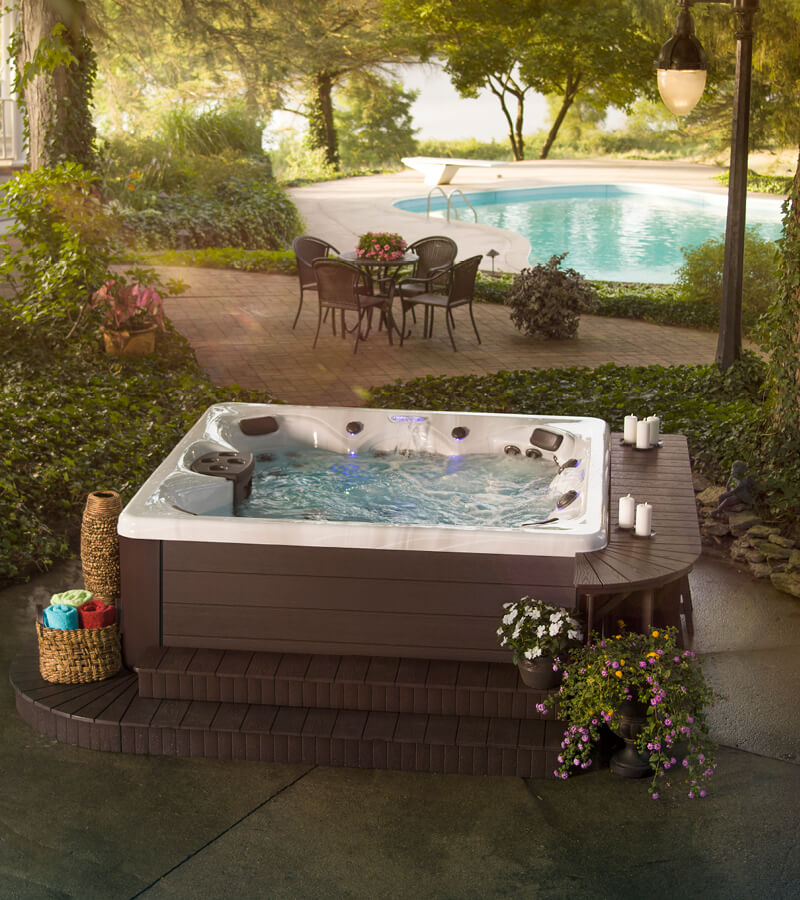 Pool and Hot Tub. Create the best outdoor living space by complementing existing pool with a hot tub.