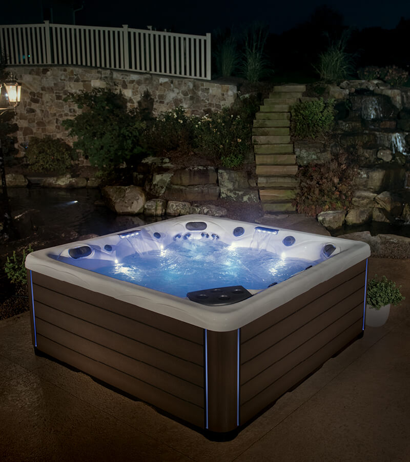 Hot Tub at Twilight. Relax day or night with a MasterSpas hot tub. LED lights illuminate waterfalls and jets.
