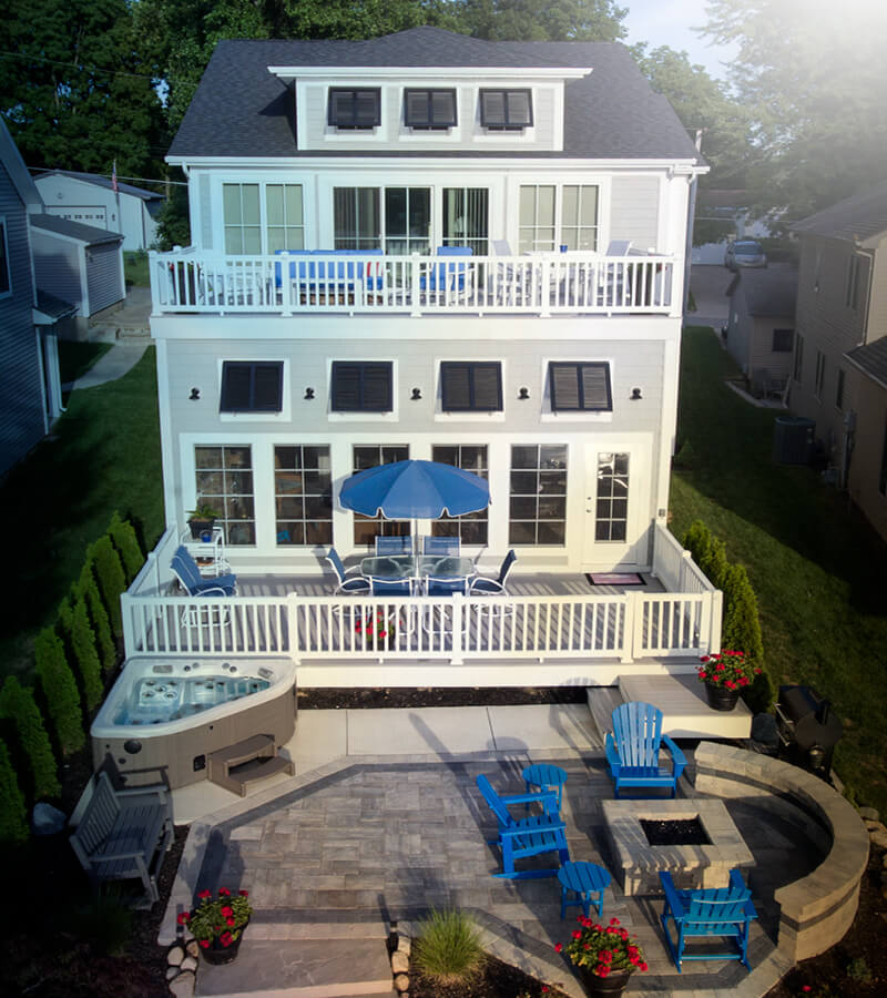 Two-Person Hot Tub. Corner hot tub fits perfectly onto this lake house patio.