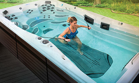 convenient home gym swim spa