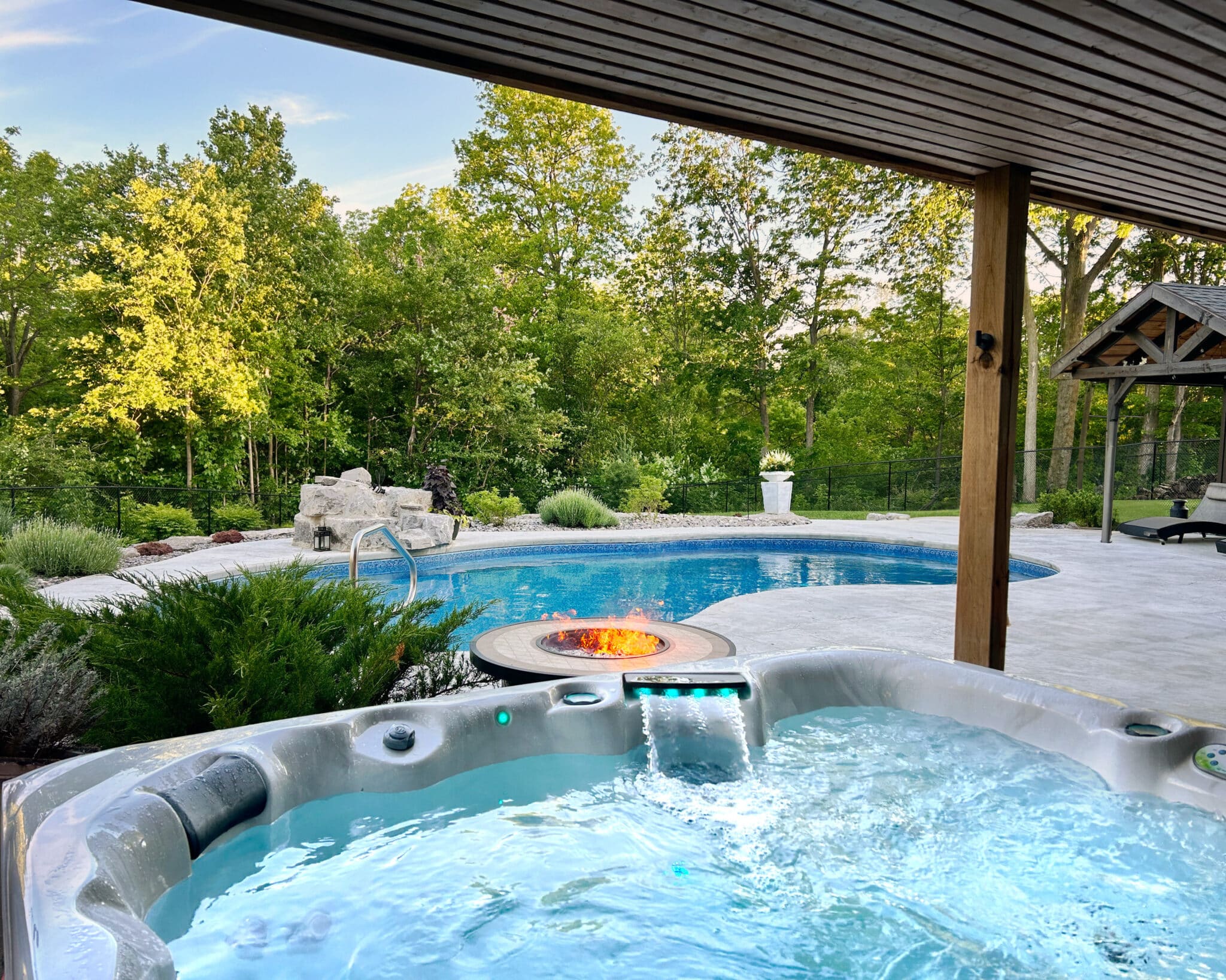 Adding a hot tub to an existing pool: what you need to know