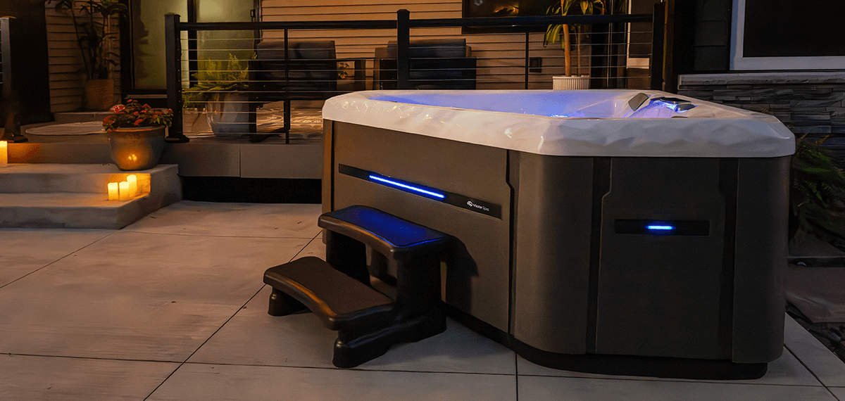 A MasterSpas Twilight hot tub in a backyard.