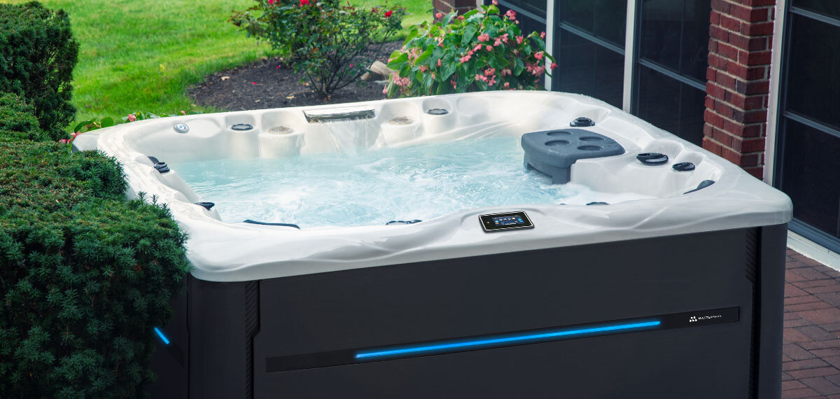 A MasterSpas Twilight hot tub in a backyard.