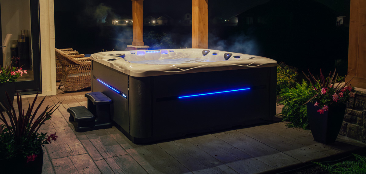 A MasterSpas Twilight hot tub in a backyard.