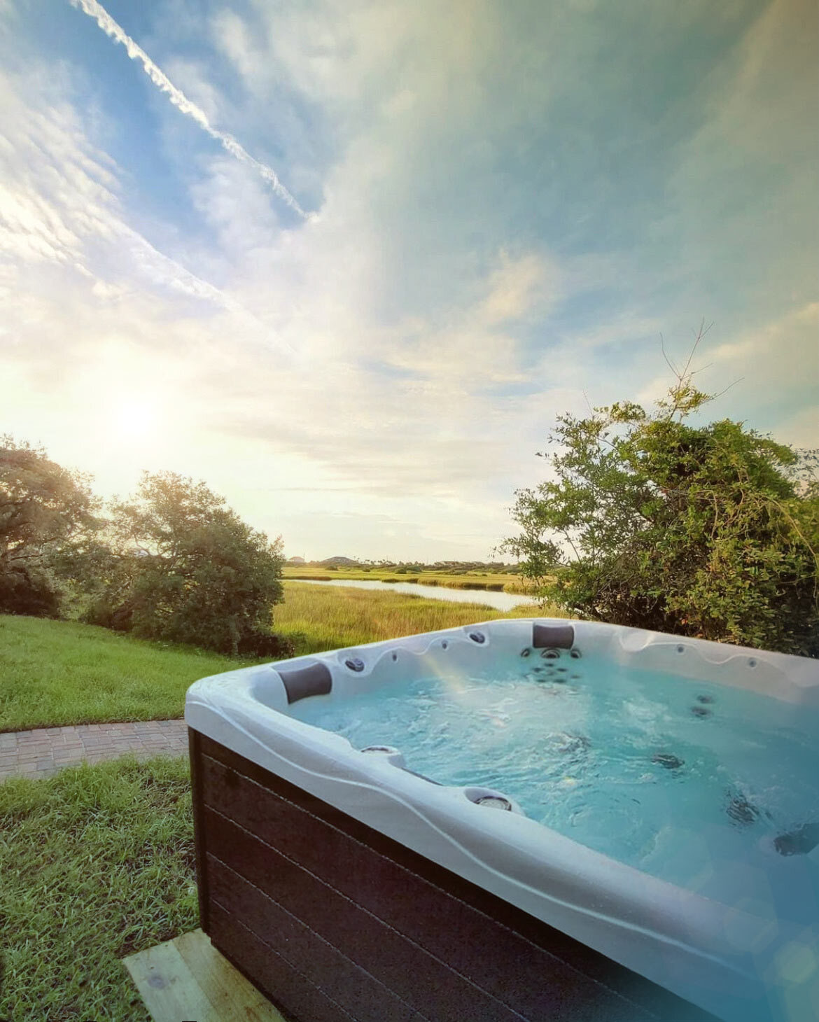 Make the most of your property and its surrounding views. This Clarity hot tub was strategically installed so soakers can take in the view of the St. Augustine waterway.