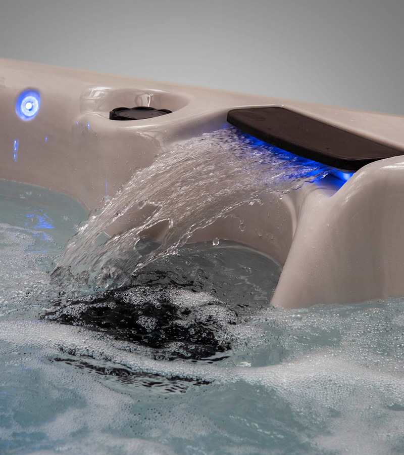 Features like waterfalls and hot tub lights enhance your experience