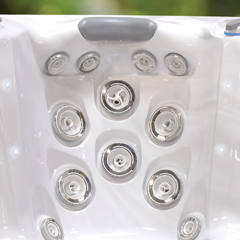 Jets inside a hot tub with radiating areas showing the therapy system.